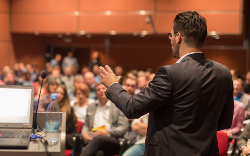 Speaker,Giving,A,Talk,On,Corporate,Business,Conference.,Audience,At